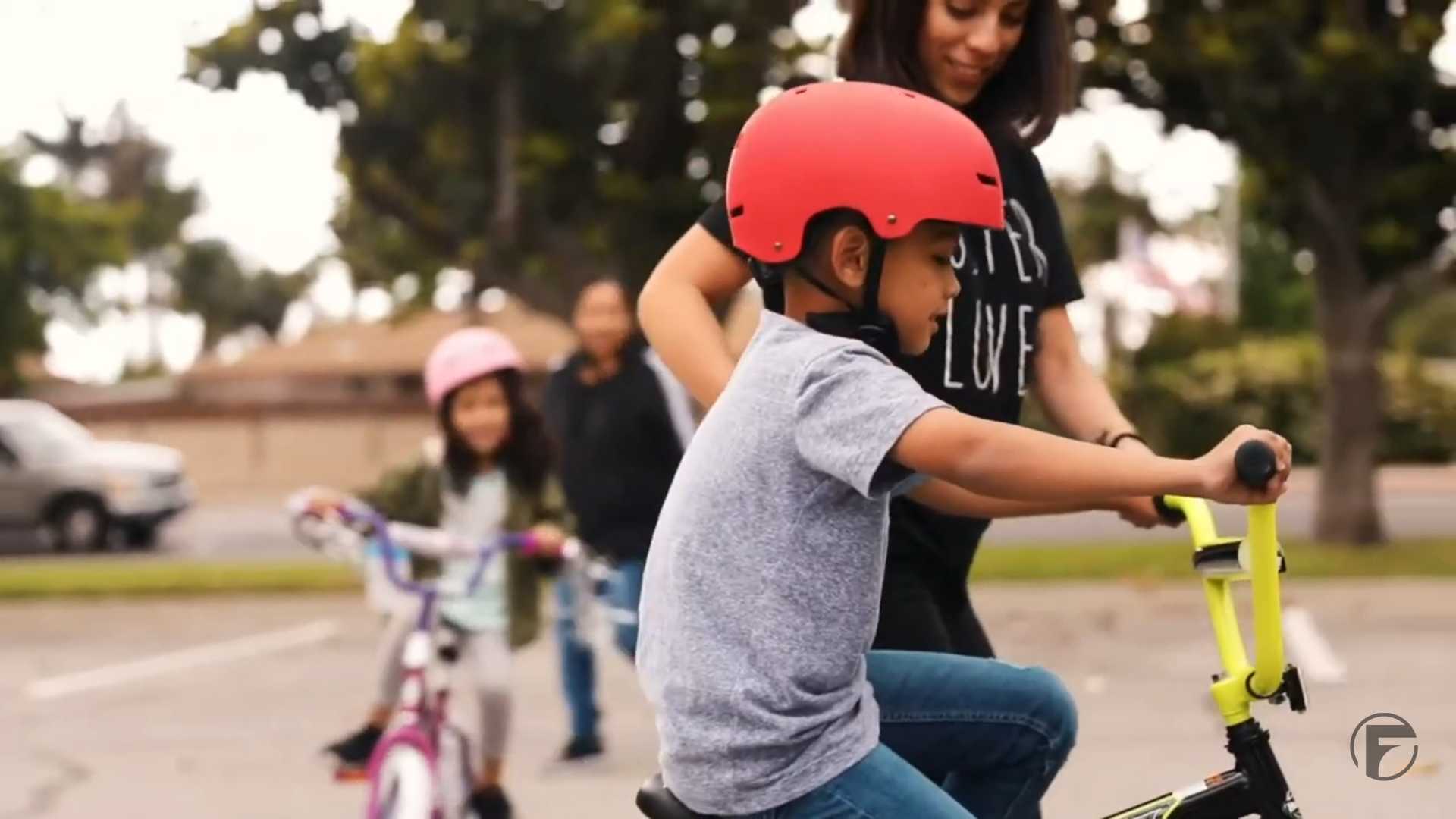 Foster youth riding bicycles